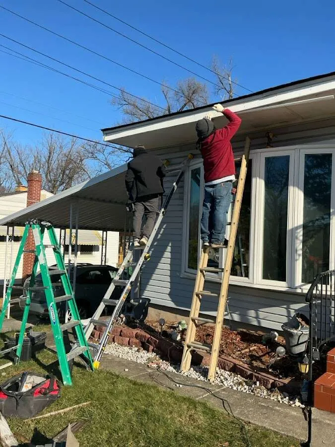 Restoration crew performing exterior repair in Schaumburg